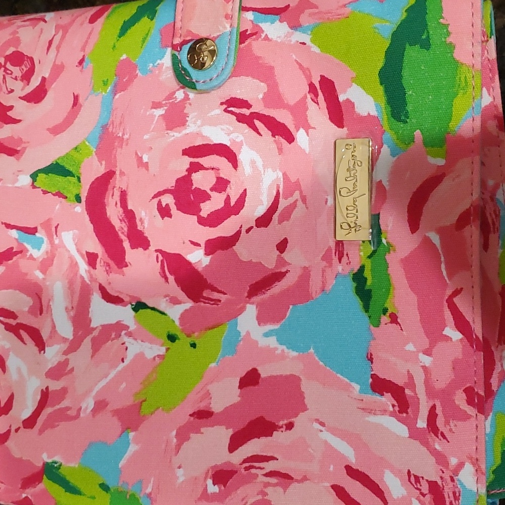 NWT foldup jewelry container in hotty pink. Four interior sections.